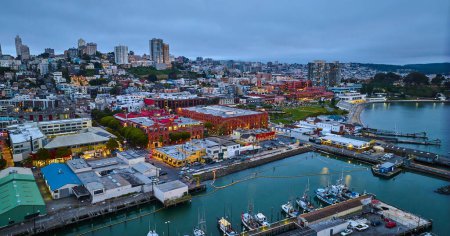 Photo for Image of Aerial city lights in San Francisco at dusk near Hyde St Pier and Fishermans Wharf on coast - Royalty Free Image