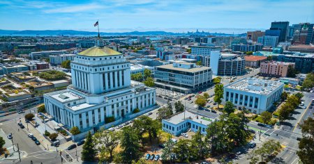 Photo for Image of Aerial Alameda County Superior Courthouse in downtown Oakland California with distant San Francisco - Royalty Free Image