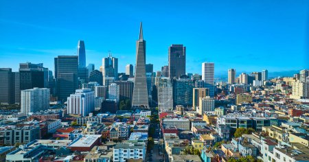 Photo for Image of Sunny San Francisco city aerial with clear blue sky behind downtown skyscrapers, CA - Royalty Free Image