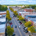 Aerial View of Charming Downtown Goshen, Indiana, with Historic Courthouse and Brick Buildings