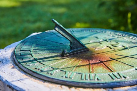 Photo for Sunlit Antique Sundial in Muncie Conservatory Garden, Indiana, 2023 - Royalty Free Image