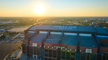 Photo for Sunset over Lucas Oil Stadium in Indianapolis, Indiana, captured in 2023 via DJI Mavic 3 drone, showcasing the grandeur of the sports arena during golden hour. - Royalty Free Image