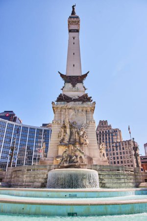 Photo for Sunny Day at the Historic Indianapolis Monument Circle, 2023 - A blend of heritage and urban modernity in downtown Indiana - Royalty Free Image