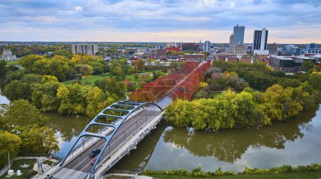 Photo for Aerial view of the Martin Luther King Bridge in Fort Wayne, Indiana during autumn, showcasing urban planning and seasonal transition. - Royalty Free Image