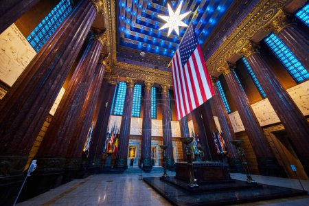 Photo for Grand Interior of the War Memorial Museum in Indianapolis, 2023 - Majestic Architecture Highlighted by the American Flag and International Banners - Royalty Free Image