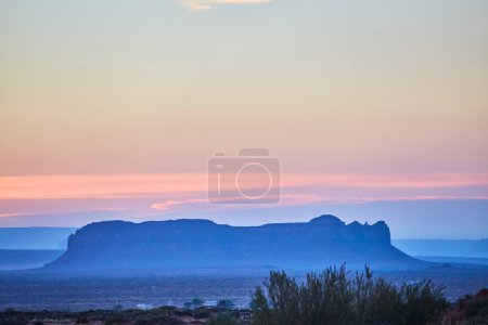 Pastel twilight over tranquil desert mesa, capturing the serene beauty of Arizonas Monument Valley, Sedona, in 2016