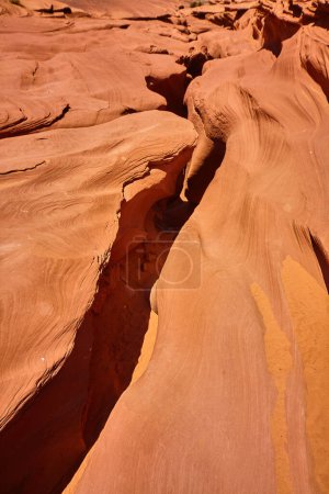 Photo for Close-up of vibrant red sandstone formation in Antelope Canyon, Arizona, showcasing natural patterns and textures formed by erosion - Royalty Free Image