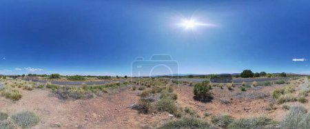 Photo for Panoramic view of a sunny desert road in Sedona, Arizona, 2016, highlighting the vastness of the arid landscape and the adventure of travel. - Royalty Free Image
