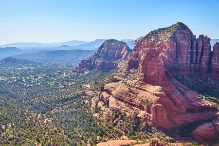 Photo for Aerial view of majestic red rock formations in Sedona, Arizona, showcasing the stark beauty of the American Southwests geology - Royalty Free Image