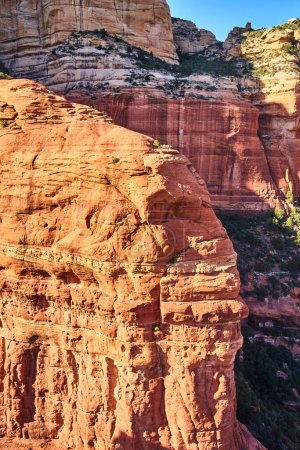 Photo for Golden Hour Glow on Striking Sedona Sandstone Cliffs, Captured from Helicopter in 2016 - Royalty Free Image