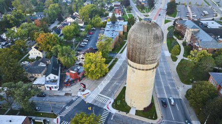 Photo for Aerial View of Historic Ypsilanti Water Tower Dominating Suburban Landscape at Early Evening - Royalty Free Image