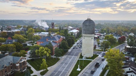 Photo for Early morning aerial view of the historic Ypsilanti Water Tower in Michigans suburban landscape, showcasing a harmonious blend of nature and architecture. - Royalty Free Image