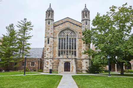Gothic architecture of University of Michigan Law Quadrangle, Ann Arbor, captured in a serene summer setting