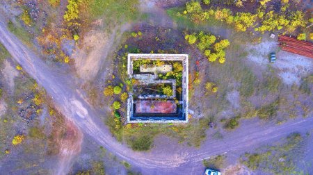 Aerial View of Abandoned Structure Reclaimed by Nature in Houghton, Michigan