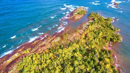 Aerial Drone Shot of Lush Copper Harbor in Fall, Michigan, Encased in Lake Superiors Vivid Blues