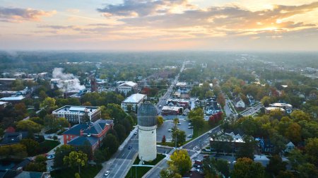 Photo for Aerial View of Ypsilanti, Michigan at Golden Hour Featuring Historic Water Tower - Royalty Free Image