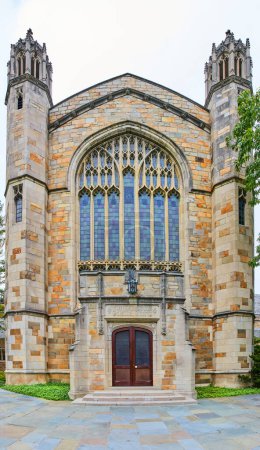 Gothic Revival architecture in serene setting at University of Michigan Law Quadrangle, highlighting history and education