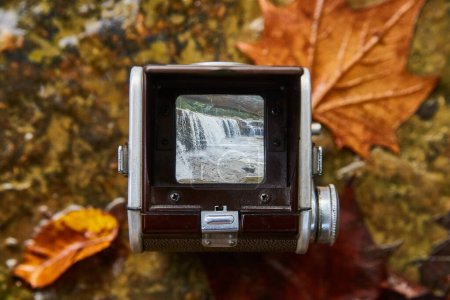 Vintage Twin-Lens Reflex Camera Capturing Autumnal Waterfall at Cataract Falls, Indiana, 2017