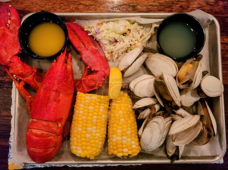 2022, Rustic Seafood Feast with Lobster and Clams in Old Orchard Beach Restaurant, Maine