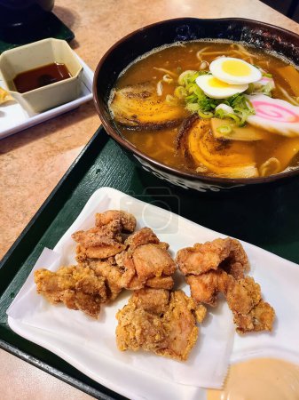 Delicious Japanese ramen and karaage served in a trendy San Francisco restaurant, California 2023