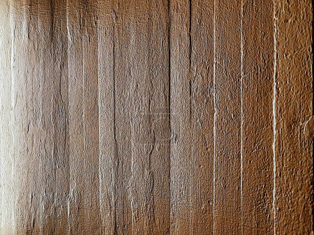 Photo for Close-up of warm-hued wood grain texture, highlighting natural imperfections and linear grooves, ideal for rustic design backdrops. Captured in New York, 2022. - Royalty Free Image