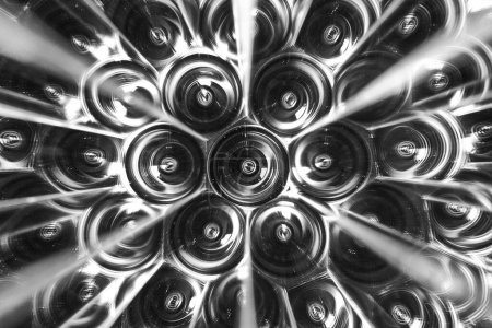 Abstract kaleidoscope of camera lenses creating a symmetrical pattern, illustrating precision and modern aesthetic.