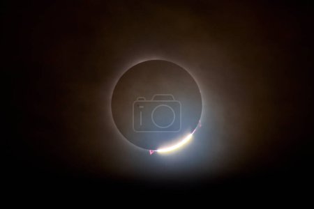 Spectacular Total Solar Eclipse Illuminating Dark Indiana Sky, Showcasing Stunning Diamond Ring Effect, 2024