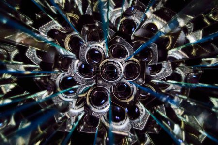 Vintage camera lenses assembled in a kaleidoscopic pattern, capturing the artistry of photography and the allure of optical illusions.