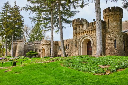 Majestic Stone Castle at Bishop Simon Brute College, Indiana - A Testament to Medieval Architecture Amidst Verdant Landscape