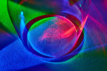 Abstract Spectrum: A Macro View of Light Refracting Through Glass in Fort Wayne, Indiana - A Vivid Dance of Rainbow Hues