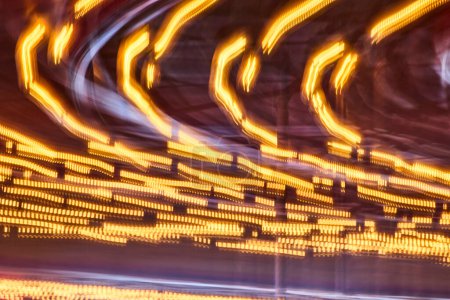 Abstract light trails capturing the essence of motion and energy in Fort Wayne, evoking urban dynamism and modernity.