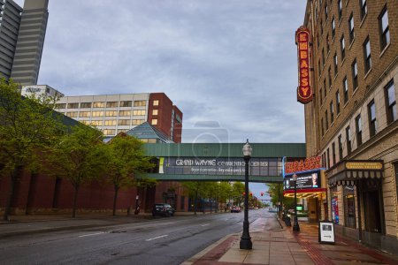 Photo for Early morning calm on a downtown Fort Wayne street, featuring Embassy Theatre and Grand Wayne Convention Center. - Royalty Free Image