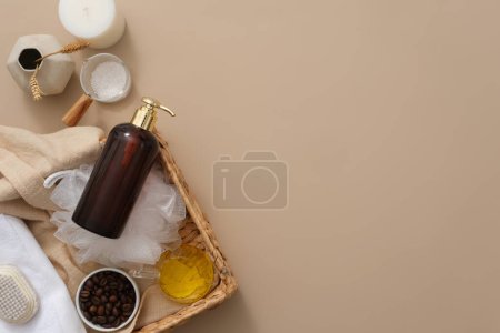Photo for On the light brown background, basket of product bottle and bath objects decorated. Amber pump bottle for design, mockup for shower gel or shampoo. Blank space for text and design - Royalty Free Image