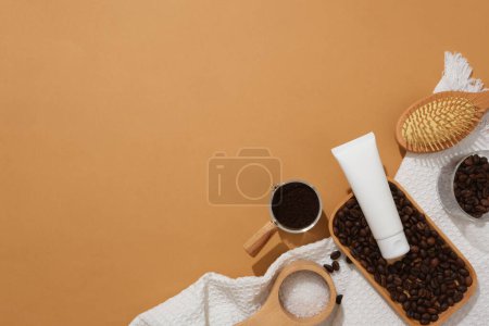 Photo for Creative background for advertising make from coffee beans and wooden props. A white plastic tube without label for design packaging. Blank space for cosmetic product presentation - Royalty Free Image