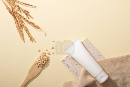 Photo for Close-up of rice bran displayed on a background with an unlabeled plastic tube on a pastel background. Rice bran accounts for about 10% of the weight of raw rice. - Royalty Free Image