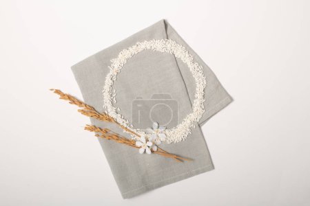 Photo for View from above of white rice arranged in a circle on a gray cloth on a white background. Creative space for product display and advertising. Copy space. - Royalty Free Image