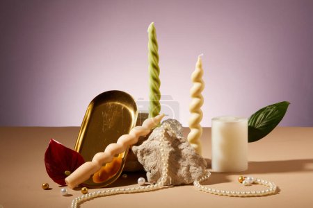 Photo for Artistic arrangement of twisted candles, a stone slab, and props on the backdrop. Candles commonly enhance aesthetics at parties and events. Copy space. - Royalty Free Image