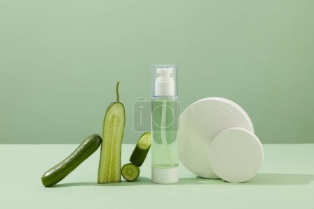 Photo for Fresh cucumber and natural beauty face toner in a transparent plastic bottle with copy space. Spa and beauty concept. Commercial image. - Royalty Free Image