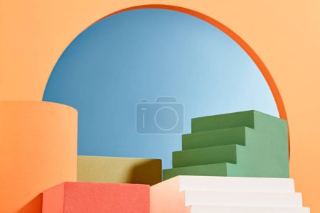 Photo for Staircases displayed with podiums in cylinder and square shaped. Blue background. Pedestal or platform for beauty products presentation - Royalty Free Image