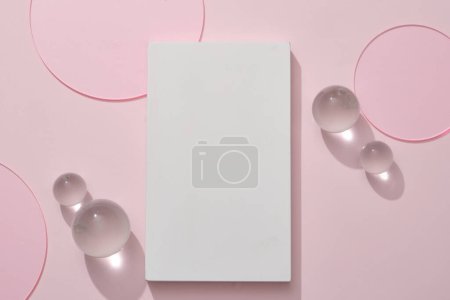 Photo for Background minimal style for product branding presentation - rectangle podium with glass balls and round acrylic sheets on pink background. - Royalty Free Image