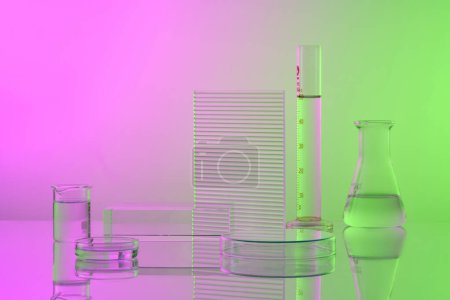 Pedestal for product display presentation with transparent podium, laboratory glassware filled transparent liquid on color background. Minimal concept.