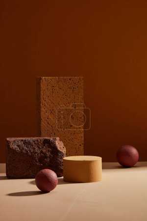 Photo for Front view of round empty platform surrounded by bricks and dark spheres, are on brown background. Abstract background minimal style for product presentation. - Royalty Free Image