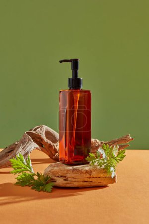 Photo for A stone with transparent pump bottle standing on. Branding mockup for product extracted from Mugwort. Mugwort (Artemisia vulgaris) helps prevent eczema - Royalty Free Image