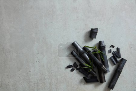 Photo for Pile of natural broken black activated charcoal in the right corner - Royalty Free Image