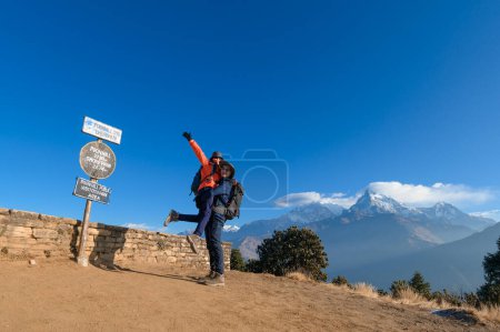 Photo for A young traveller trekking in Poon Hill view point in Ghorepani, Nepal - Royalty Free Image