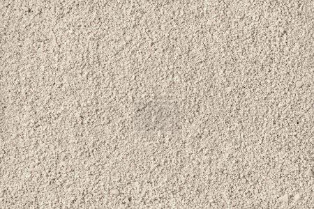 Foto de Playa de arena neutra textura beige, un fondo estético de vacaciones de verano, espacio de copia - Imagen libre de derechos