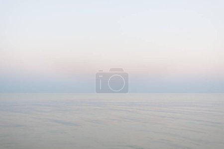Photo for Neutral pastel watercolor gradient texture background, soft colored sea and sky during the down, beautiful aesthetic marine landscape, copy space - Royalty Free Image
