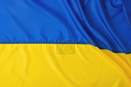 Téléchargez les photos : Drapeau ukrainien bannière, jaune bleu plié tissu de soie fond texture. Symbole national de l'Ukraine pays, gouvernement. Jour de l'indépendance, concept de liberté., modèle avec espace de copie - en image libre de droit