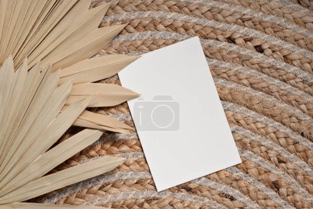 Photo for Elegant classic minimalist business branding template, blank paper card with mock up copy space on a warm neutral beige jute background - Royalty Free Image