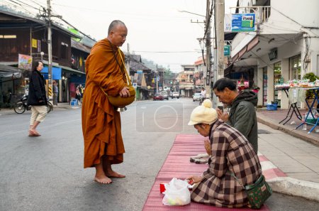 Photo for Buddhist monks on the street of Thailand, Chiang Mai. May 23, 2018 - Royalty Free Image